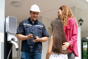 FAQ service man explaining system to woman and daughter